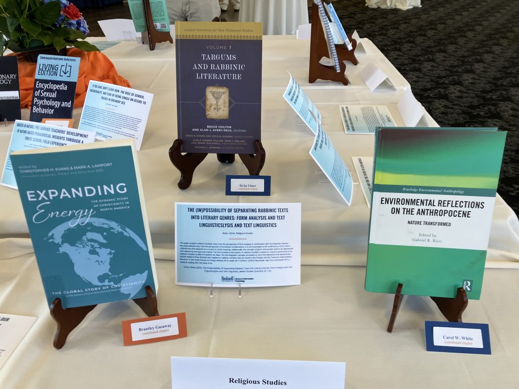 Table containing three books by Bucknell authors with cards describing each.